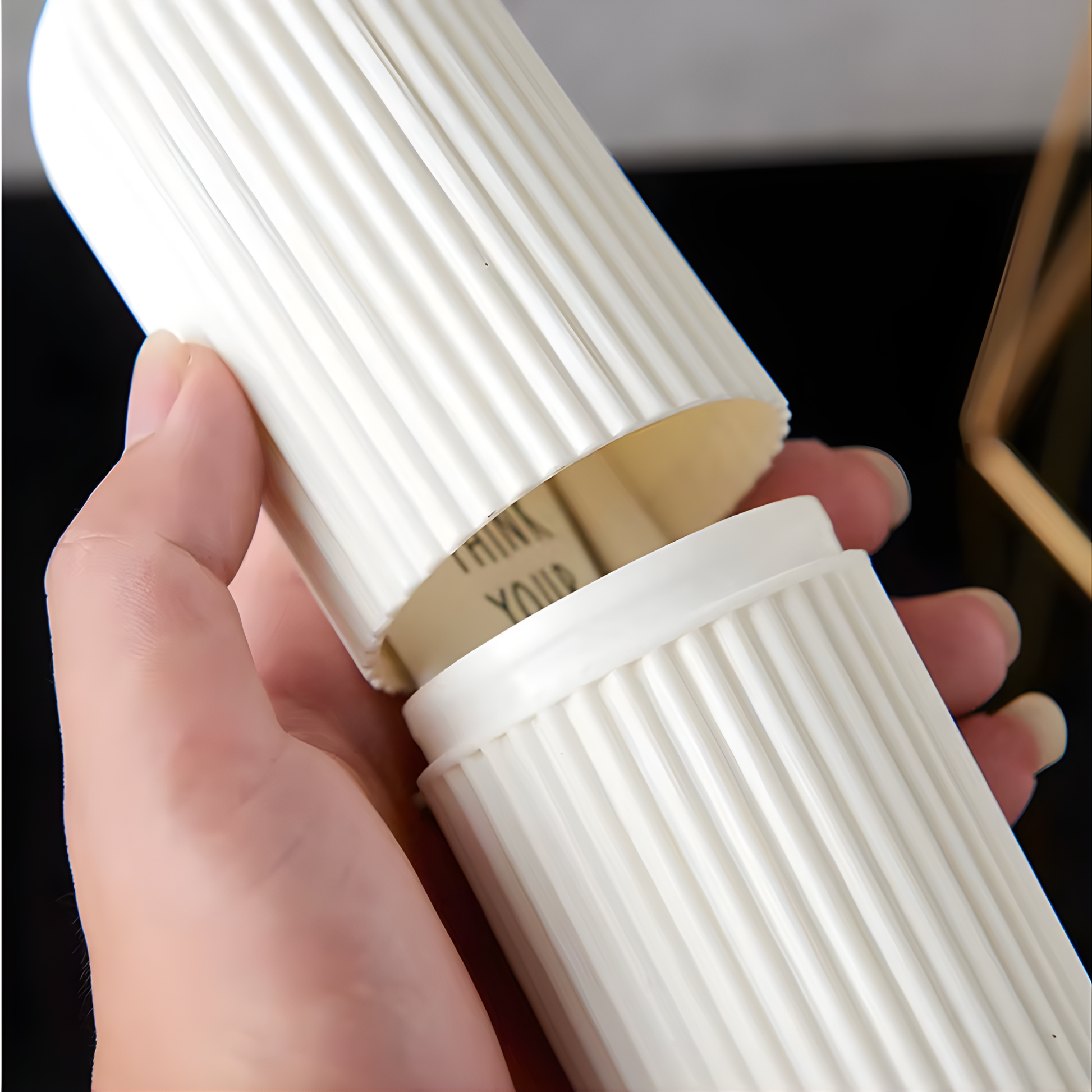 Best1 travel toothbrush holder case with a portable round design, featuring a storage cup for toothbrush and toothpaste.
