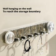 Best1 premium rotating suction wall hook rack with water ripple design and multiple heavy-duty hooks, mounted on a wall.